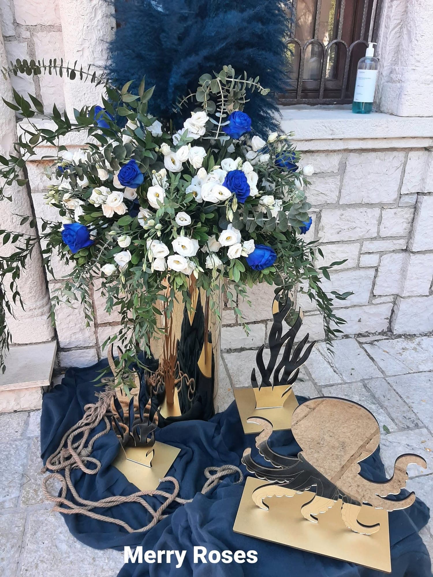 An octopus in navy and gold · Efthymios — 3