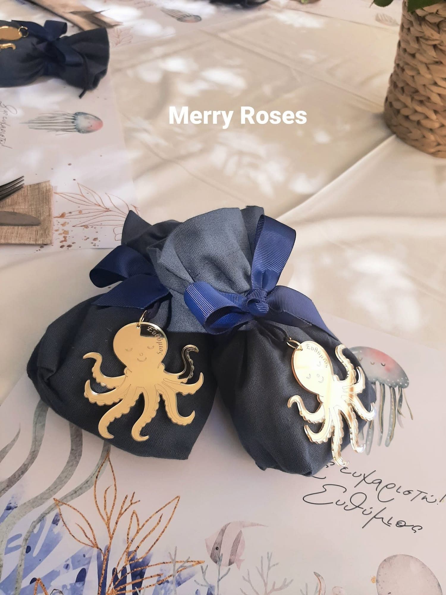 An octopus in navy and gold · Efthymios — 11
